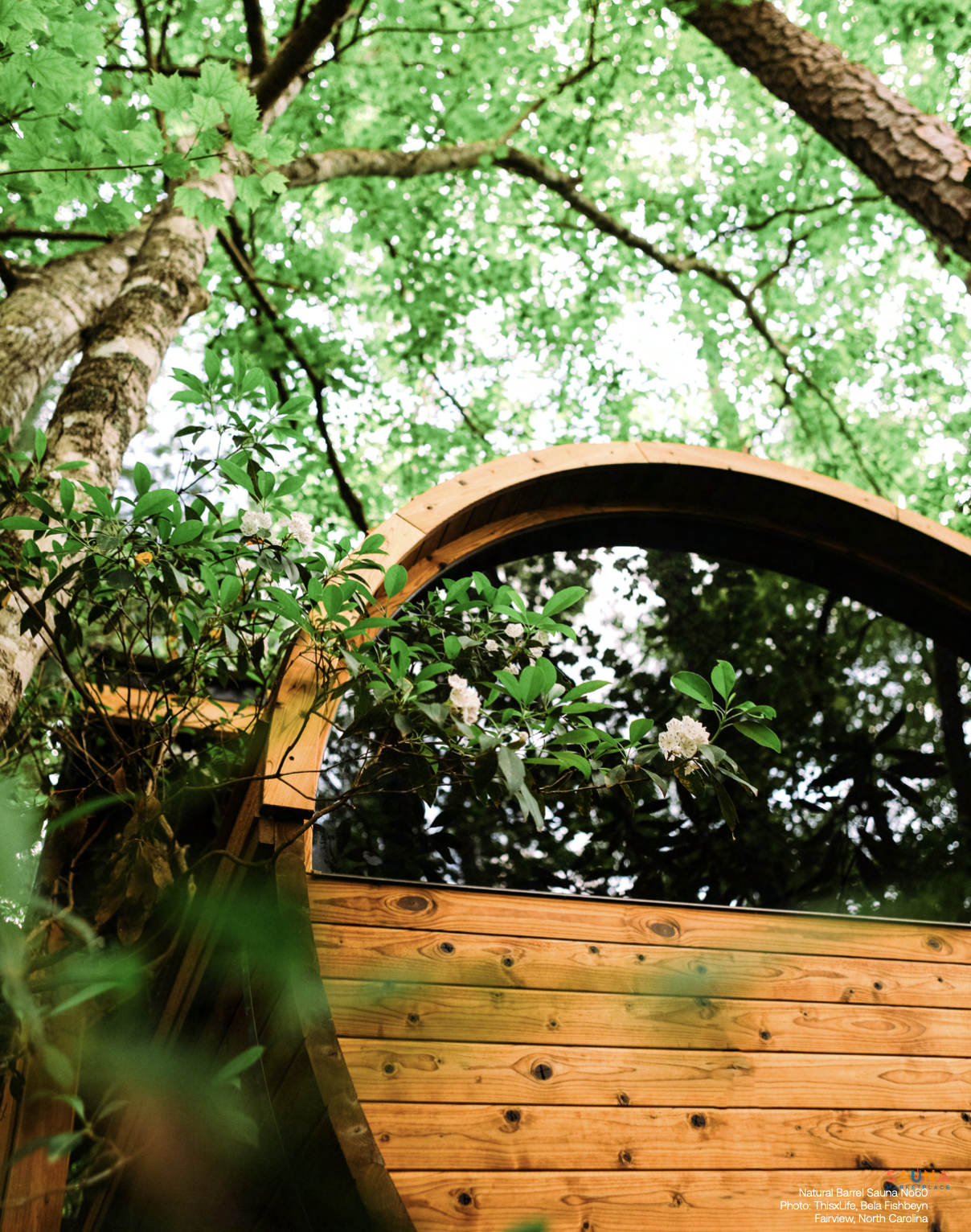 thermory barrel sauna with panoramic back window